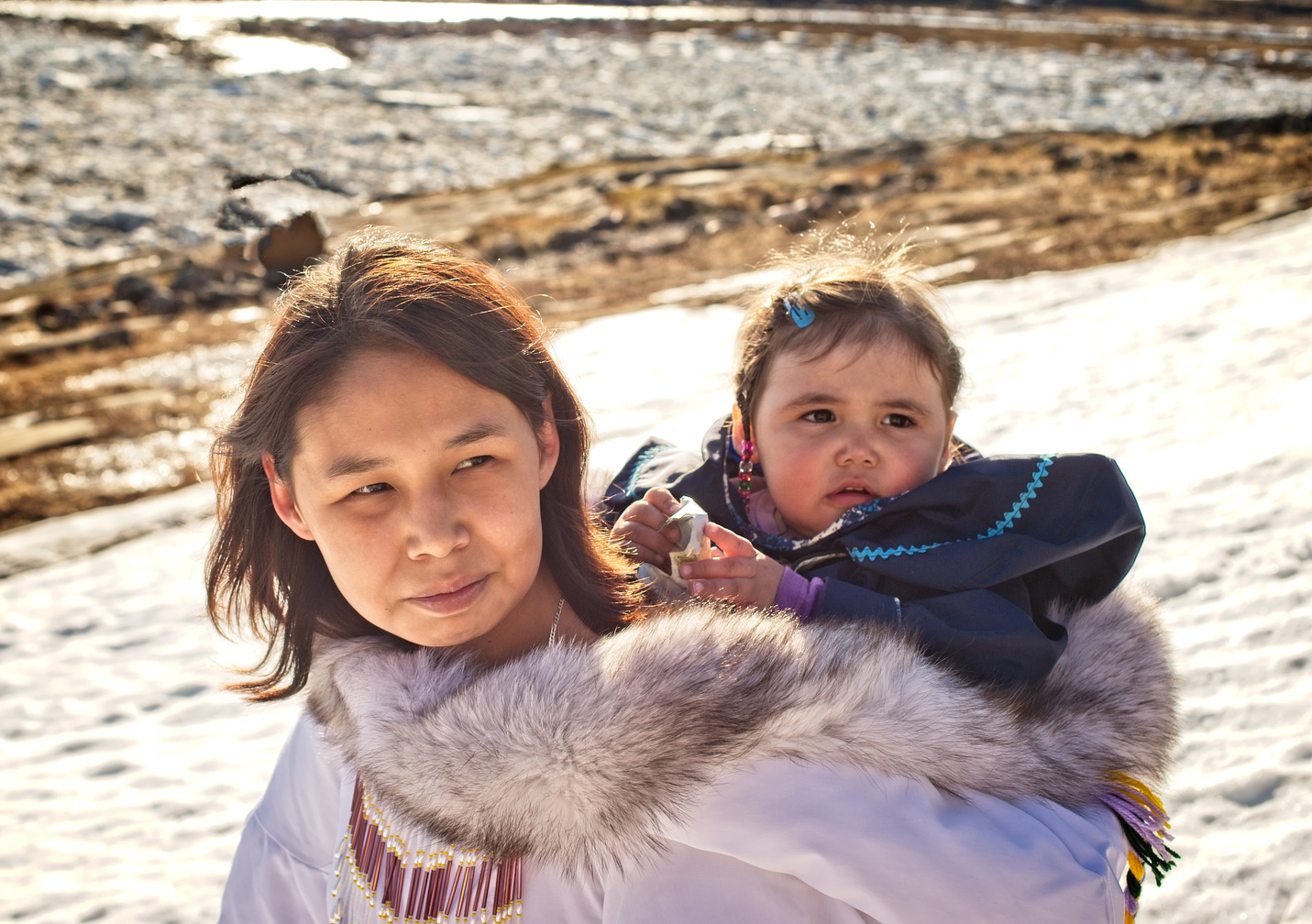 Inuit mother and daughter on Baffin Island, Nunavut, Canada.